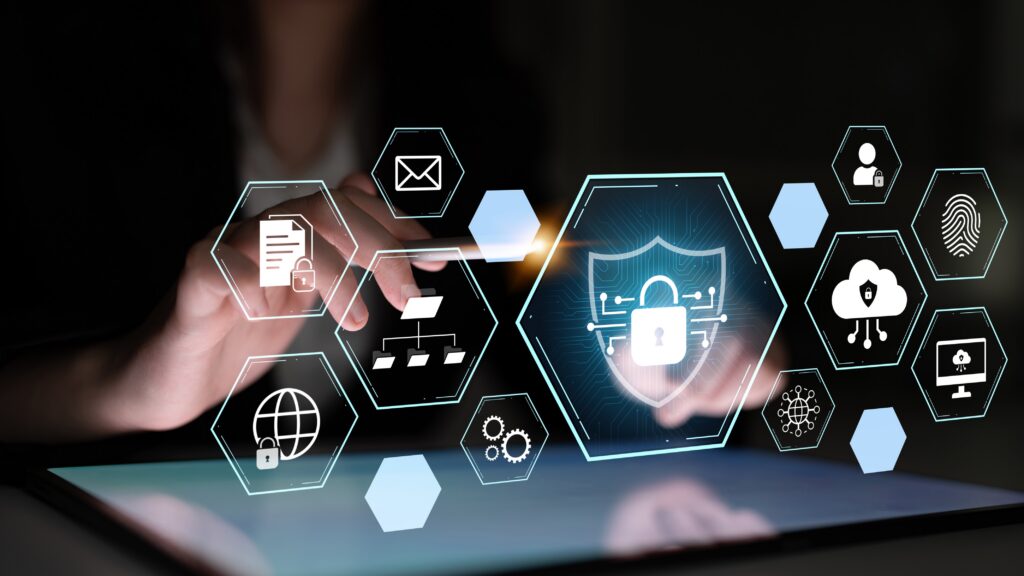 A centralized security operations center showing a person interacting with a tablet and glowing cybersecurity icons: locks, fingerprint, shield, documents, and network symbols